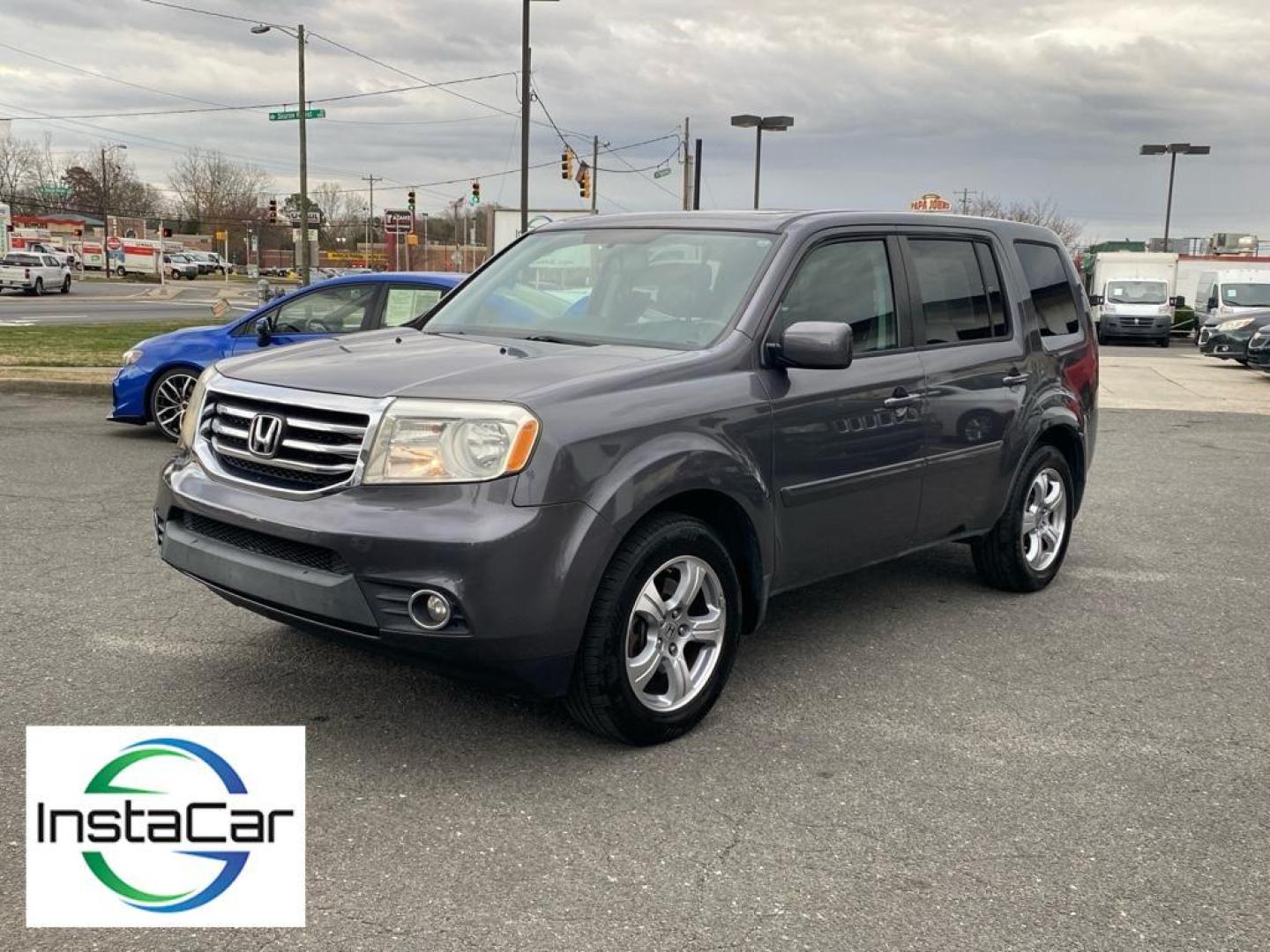 2014 Modern Steel Metallic /Black Honda Pilot EX-L (5FNYF3H53EB) with an V6, 3.5L engine, 5-speed automatic transmission, located at 3147 E Independence Blvd, Charlotte, NC, 28205, 35.200268, -80.773651 - Discover the 2014 Honda Pilot EX-L, a versatile SUV that combines comfort, performance, and advanced technology. Equipped with a robust V6, 3.5L engine, this vehicle delivers a smooth and powerful driving experience, ideal for both city commutes and long road trips.<br><br>The exterior design of the - Photo#7