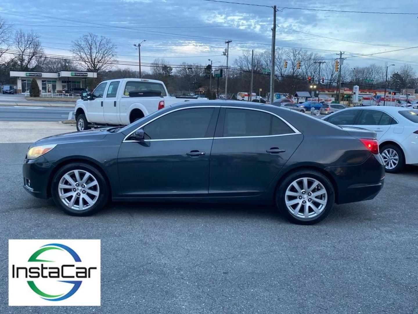 2014 Ashen Gray Metallic /Jet Black/Titanium Chevrolet Malibu LT (1G11E5SL9EF) with an 4 Cyl, 2.5L engine, 6-speed automatic transmission, located at 3147 E Independence Blvd, Charlotte, NC, 28205, 35.200268, -80.773651 - <b>Equipment</b><br>This unit features a hands-free Bluetooth phone system. The Chevrolet Malibu keeps you comfortable with Auto Climate. The leather seats in this mid-size car are a must for buyers looking for comfort, durability, and style. The Chevrolet Malibu emanates grace with its stylish gray - Photo#6