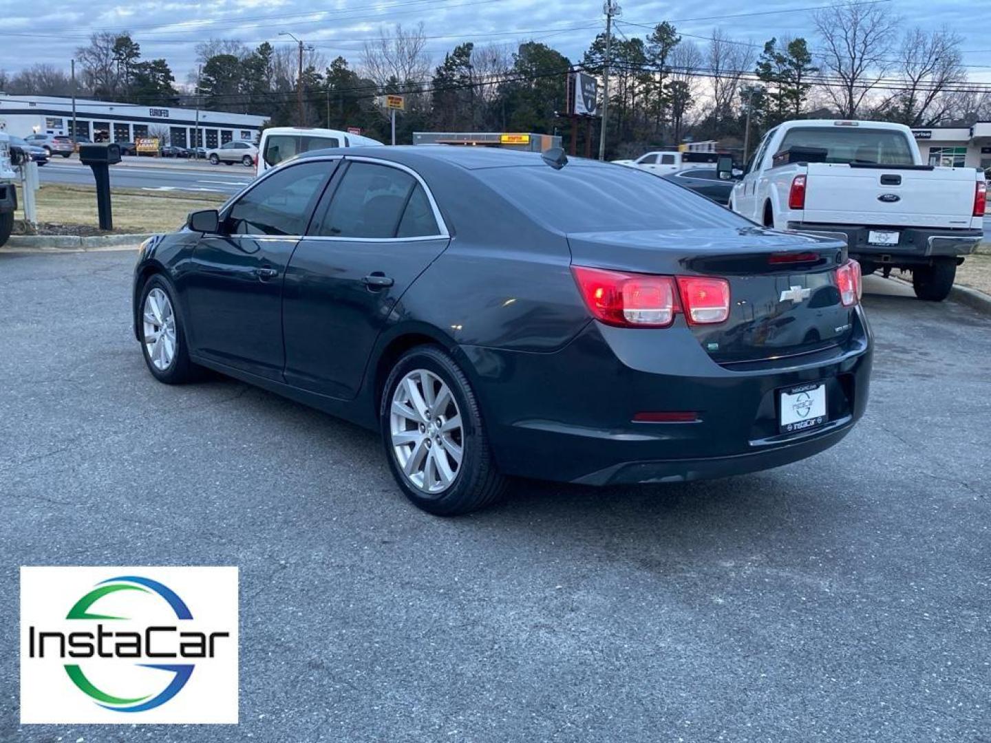 2014 Ashen Gray Metallic /Jet Black/Titanium Chevrolet Malibu LT (1G11E5SL9EF) with an 4 Cyl, 2.5L engine, 6-speed automatic transmission, located at 3147 E Independence Blvd, Charlotte, NC, 28205, 35.200268, -80.773651 - <b>Equipment</b><br>This unit features a hands-free Bluetooth phone system. The Chevrolet Malibu keeps you comfortable with Auto Climate. The leather seats in this mid-size car are a must for buyers looking for comfort, durability, and style. The Chevrolet Malibu emanates grace with its stylish gray - Photo#7